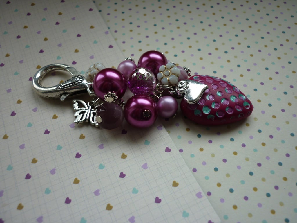 SHADES OF PINK AND SILVER HANDBAG CHARM.