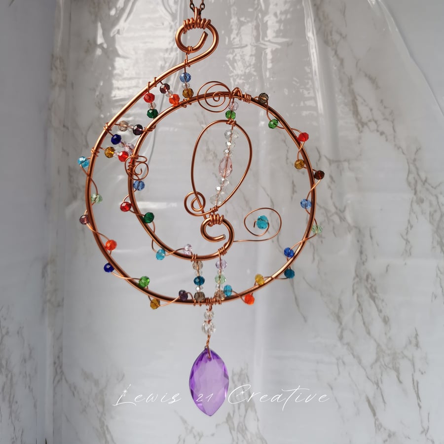 Swirl copper wire suncatcher with colourful beads & lilac dropstone