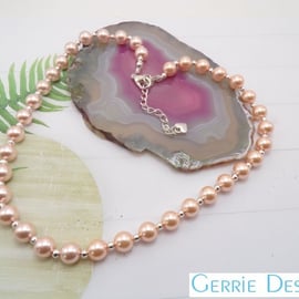Peach Round Pearl Effect & Silver Beaded Necklace. 