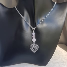 Gorgeous Rose Quartz Beads and Heart of Heart charm Necklace.