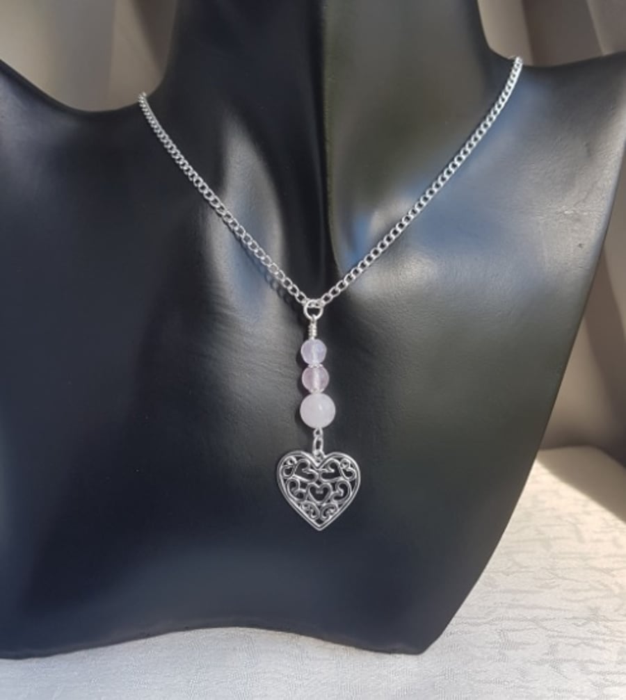 Gorgeous Rose Quartz Beads and Heart of Heart charm Necklace.