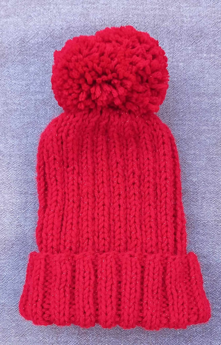 Adult bobble hat, red sparkle yarn with hand sewn chunky bobble