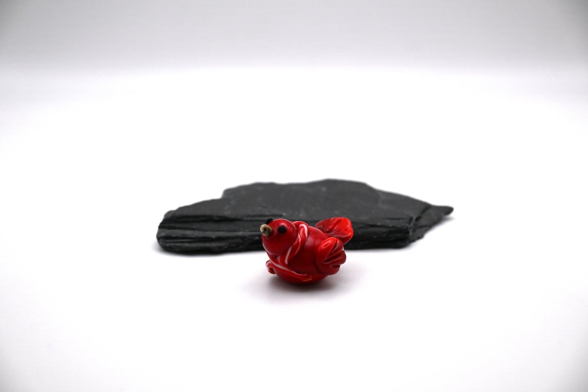 small glass red football bird