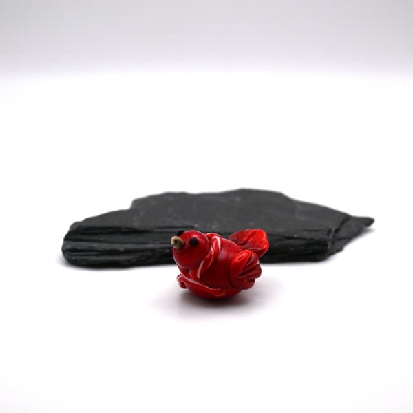 small glass red football bird