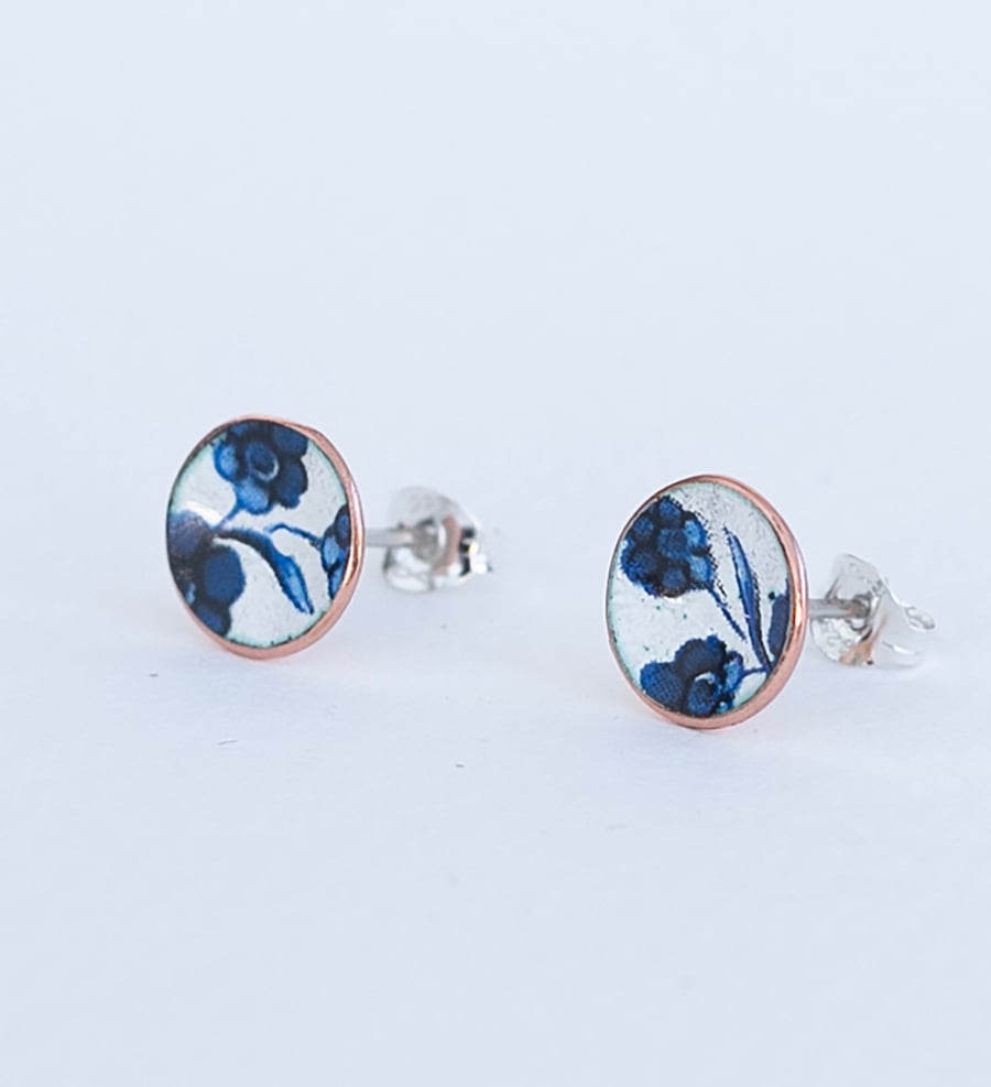 Blue and white floral enamel studs