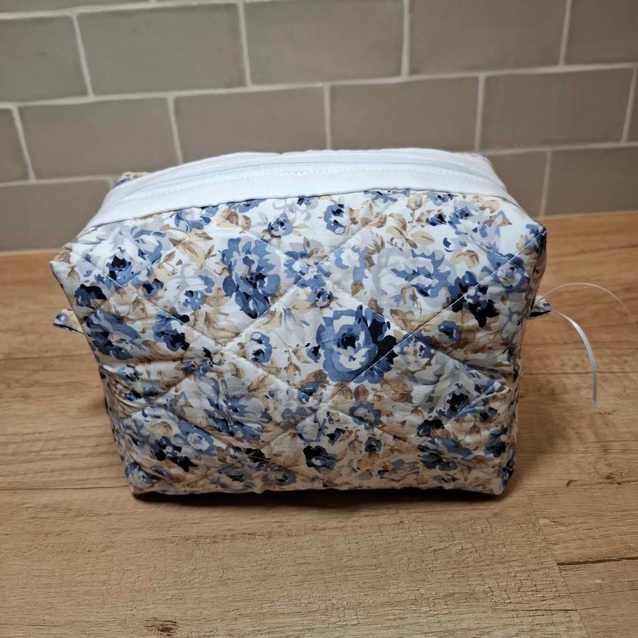 Navy blue and beige toiletry bag