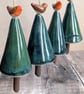One single ceramic Christmas tree dangly decoration with mini robin