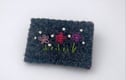 Embroidered brooches