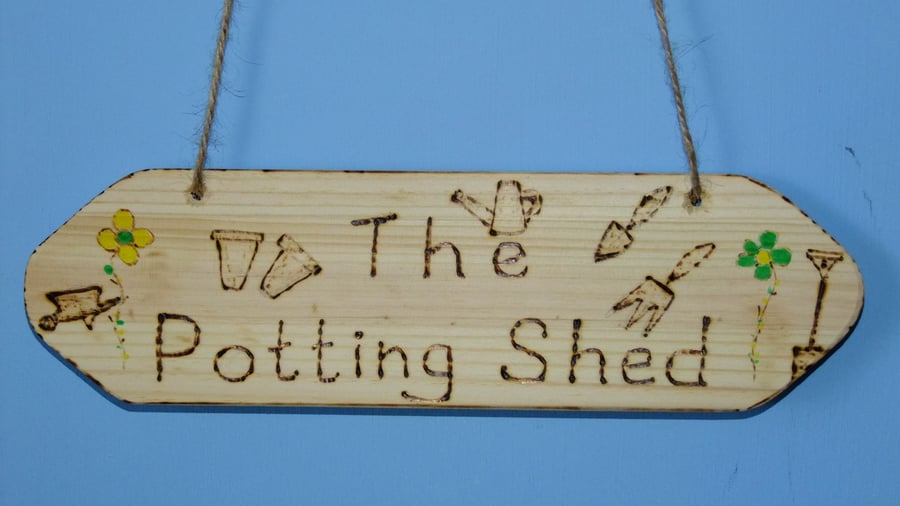 HANGING SIGN FOR THE GARDENER SAYING "IN THE POTTING SHED"