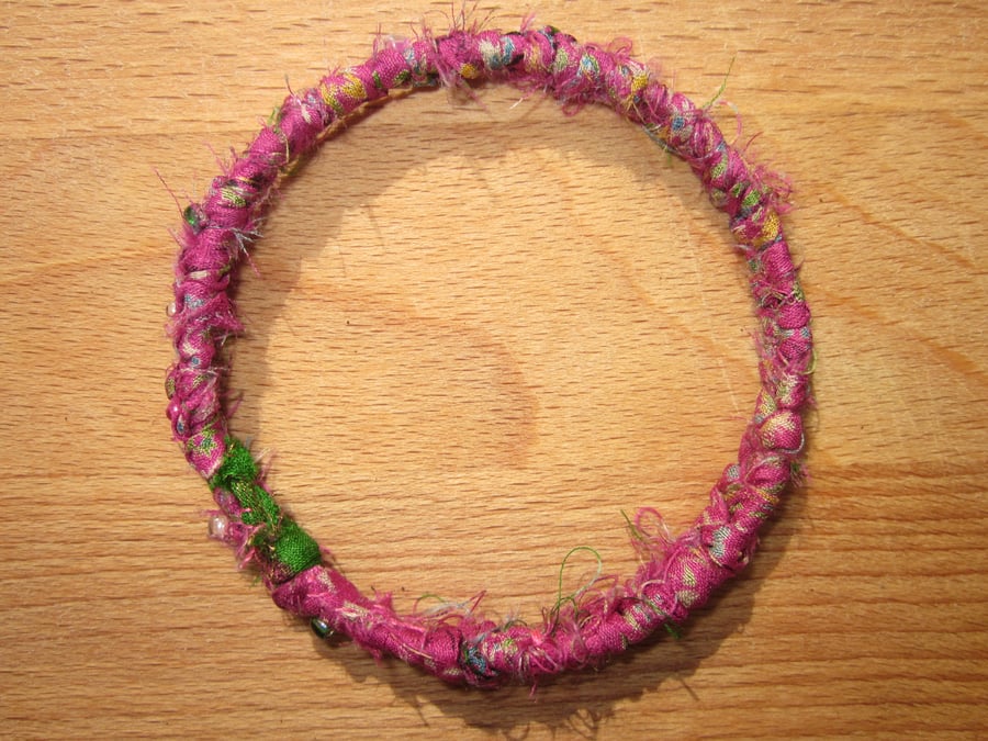 Textile bangle 'Dicentra' small to medium - recycled sari silk