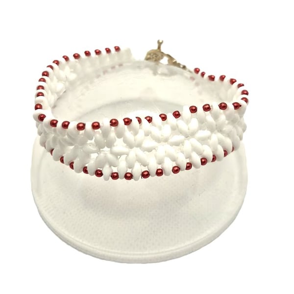 White superduo bead flower pattern bracelet with red faux pearl edging