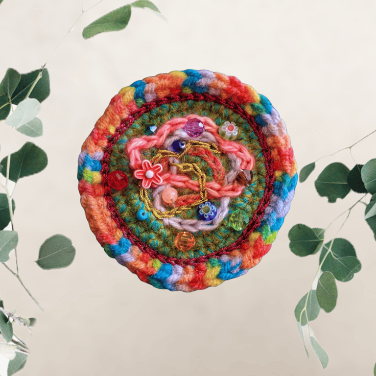 colourful freeform crochet brooch