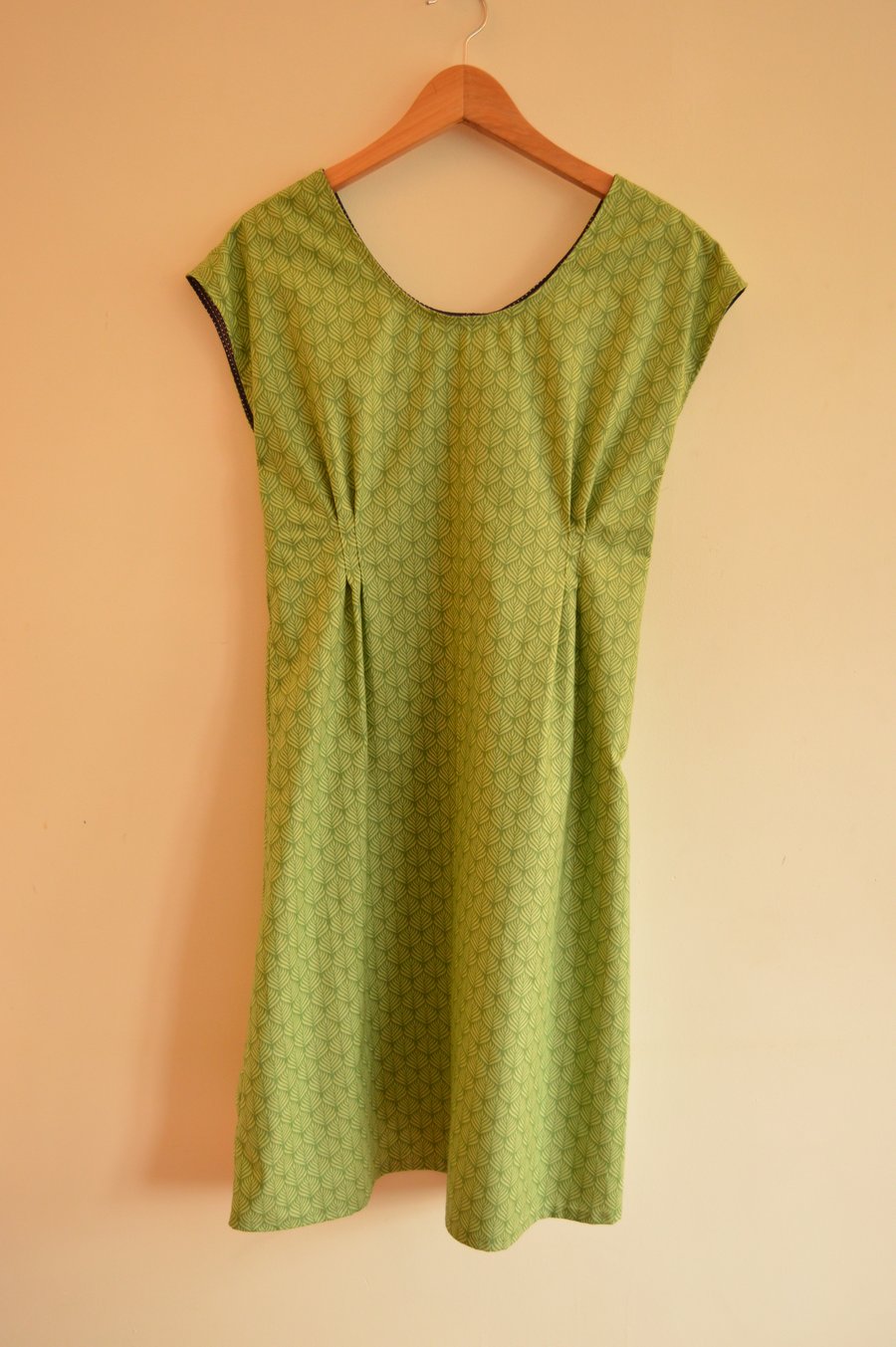Handmade green tea dress leaf print in cotton.