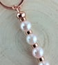 Keyring bag charm in rose gold with pale pink beads and rhinestone flower charm