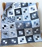 Cosy Fleece Backed Patchwork Quilt - Image 1