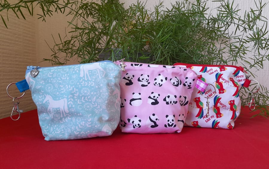 Charming, Small Sized, Fabric, Zippered Pouch For Storing Special Things.