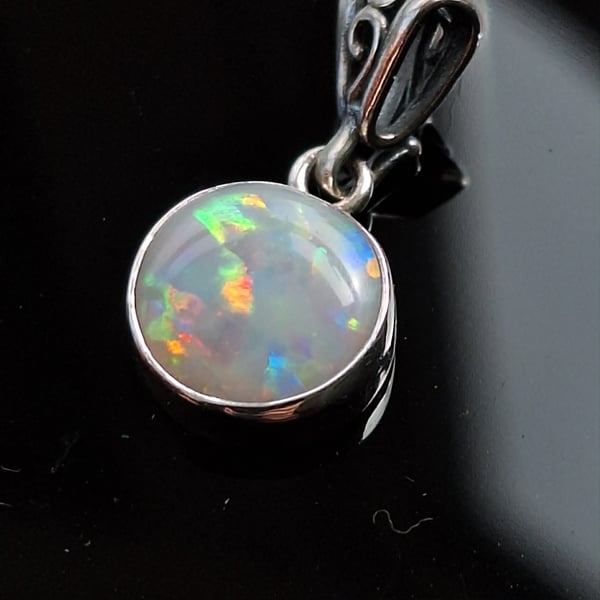 11mm 2.5ct free form CP Olympic opal set in 925 sterling silver