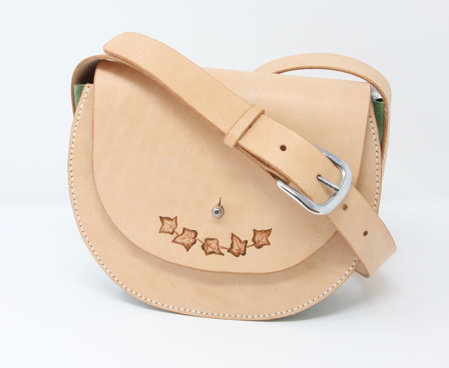 Round leather shoulder bag with ivy leaf motif