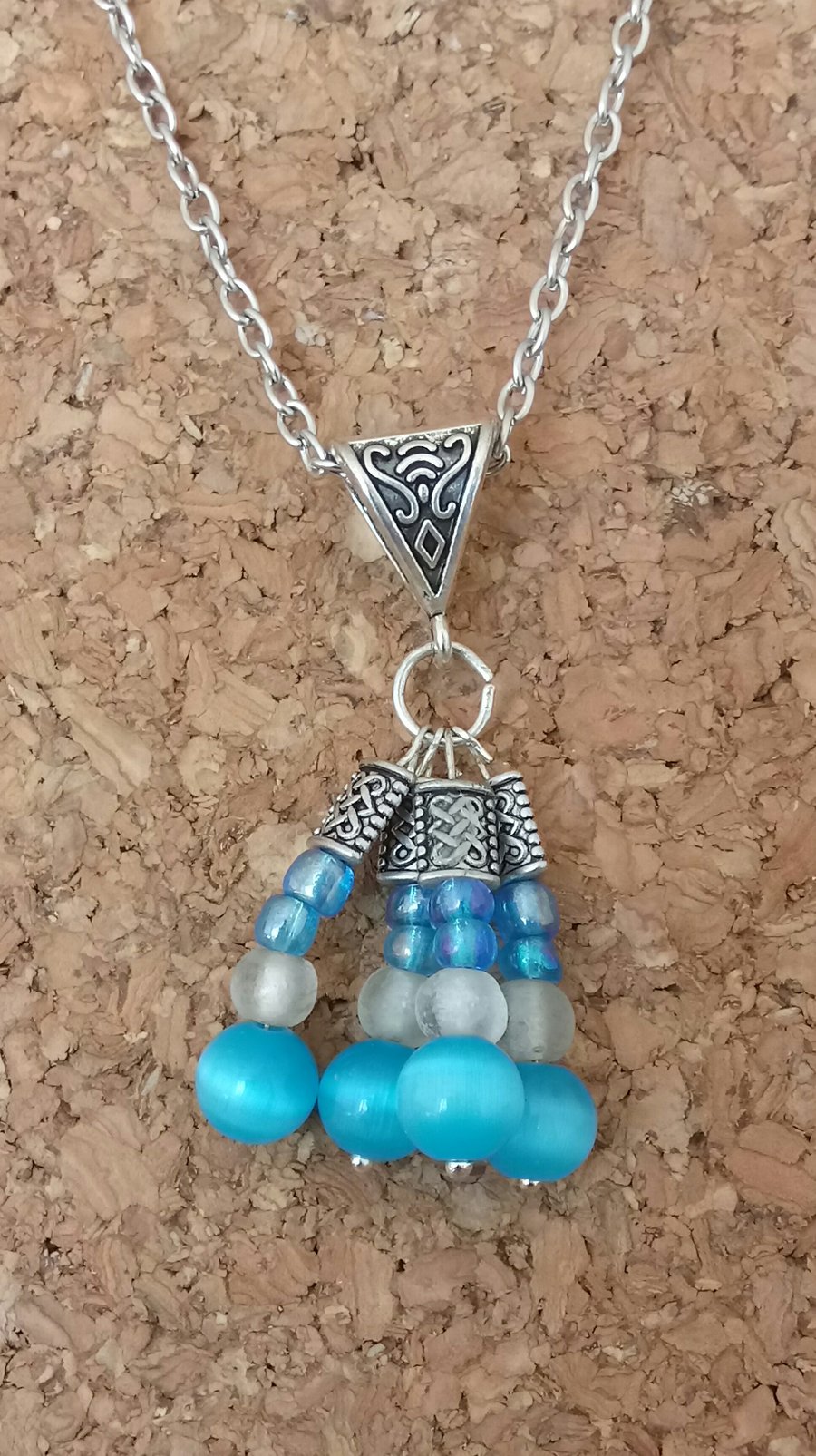 Beautiful Beaded Blue and Silver Glass Pendant