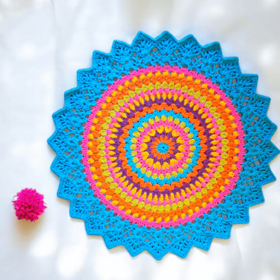 large, bright, crochet doily, mandala table mat
