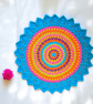 large, bright, crochet doily, mandala table mat