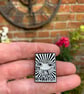 smiling eyes revolution pin, enamel - Image 3