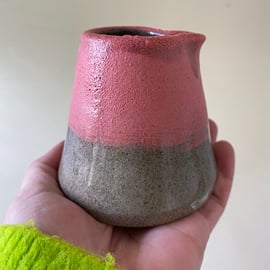 Grey and pink speckled pourer.