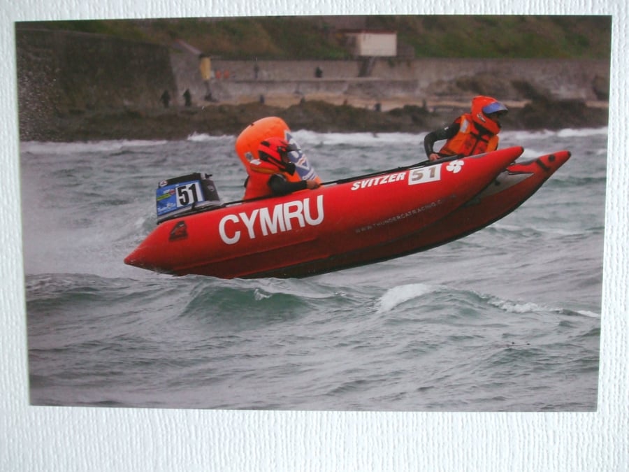 Photographic card of a "Thunder Cat" racing rib "Cymru".