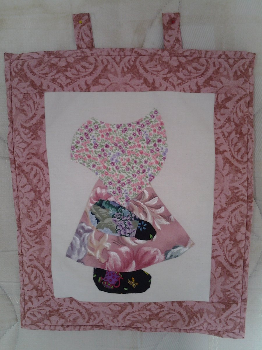 Home made Sunbonnet Sue wall hanging. Pink