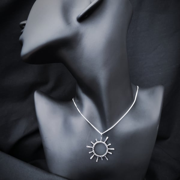 Sunny sterling silver pendant