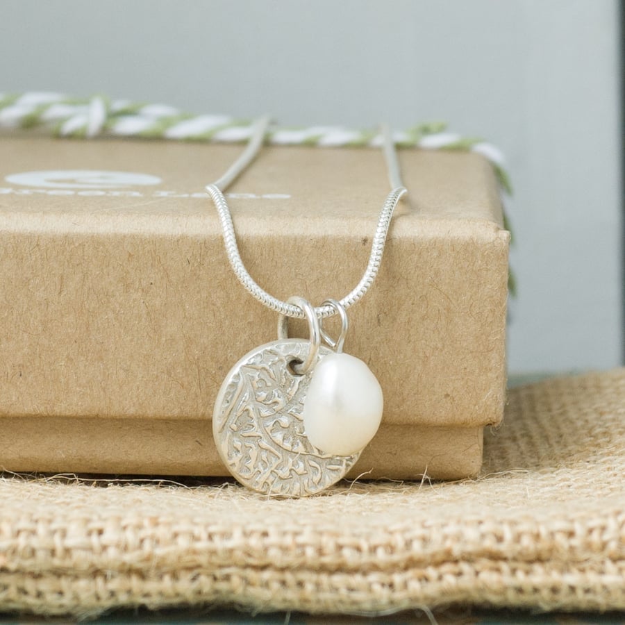 Silver Necklace with Small Circle Shaped Charm and Freshwater Pearl