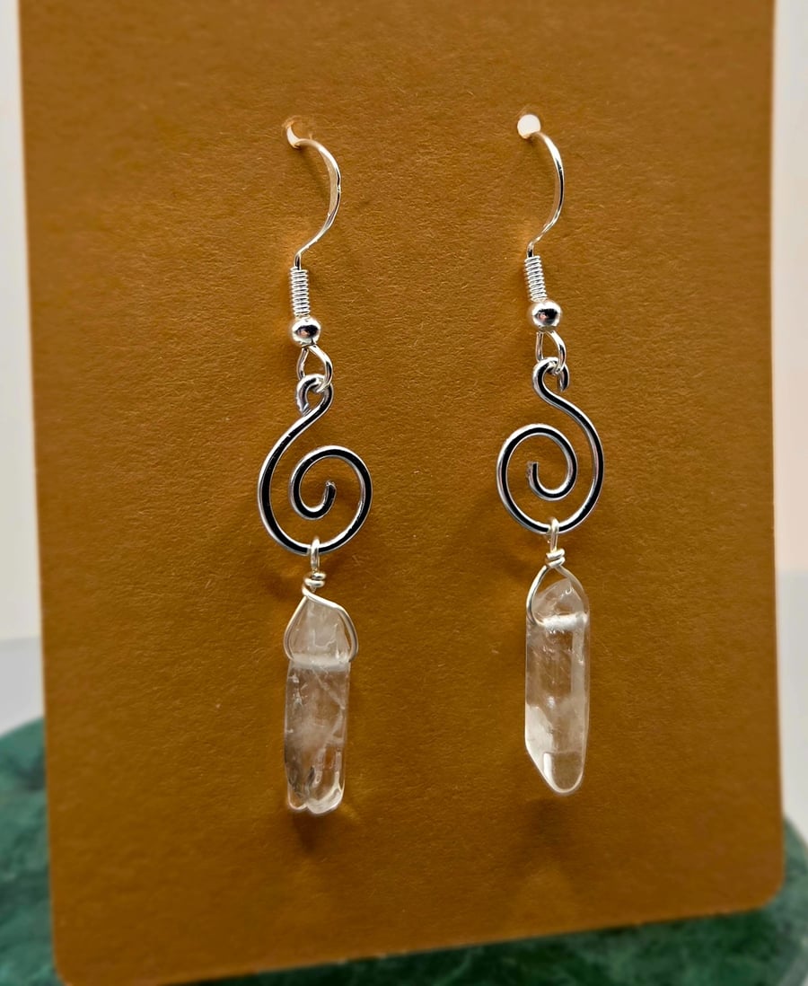 Mini silver spiral dangle earrings with polished clear quartz points