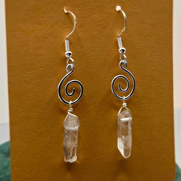 Handmade mini silver spiral dangle earrings with polished clear quartz points