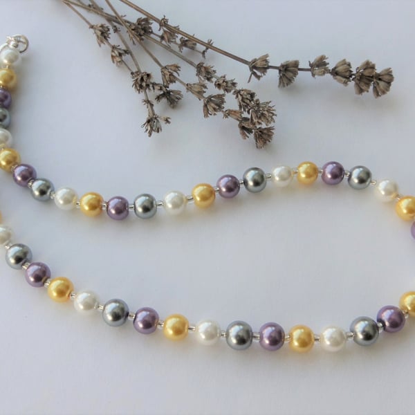 Yellow, purple, silver and white glass pearl and silver lined seed bead necklace