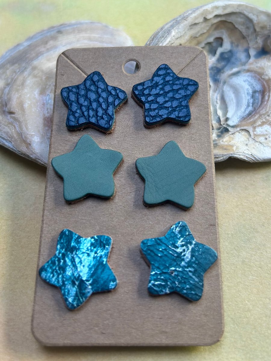 Trio of leather star earrings in blues and greens