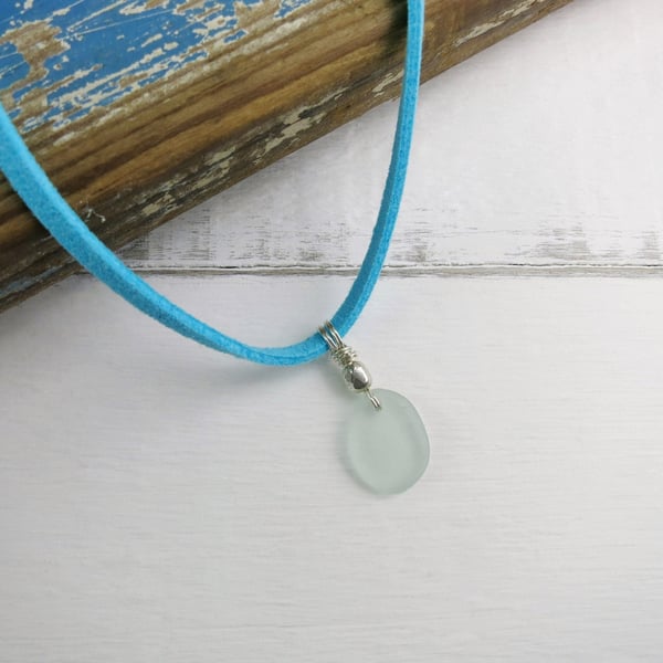 Pale Sea Foam Cornish Sea Glass Pendant on a Turquoise Faux Suede Necklace