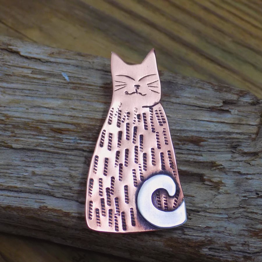Copper and silver 'tall cat' brooch , silver tail 