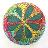 One inch badge