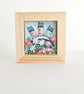 Little houses on a fabric hill, with flowers, in small wooden frame - Image 2
