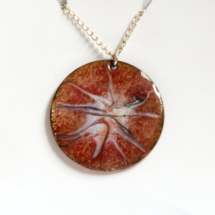 white over pale red scrolled pendant