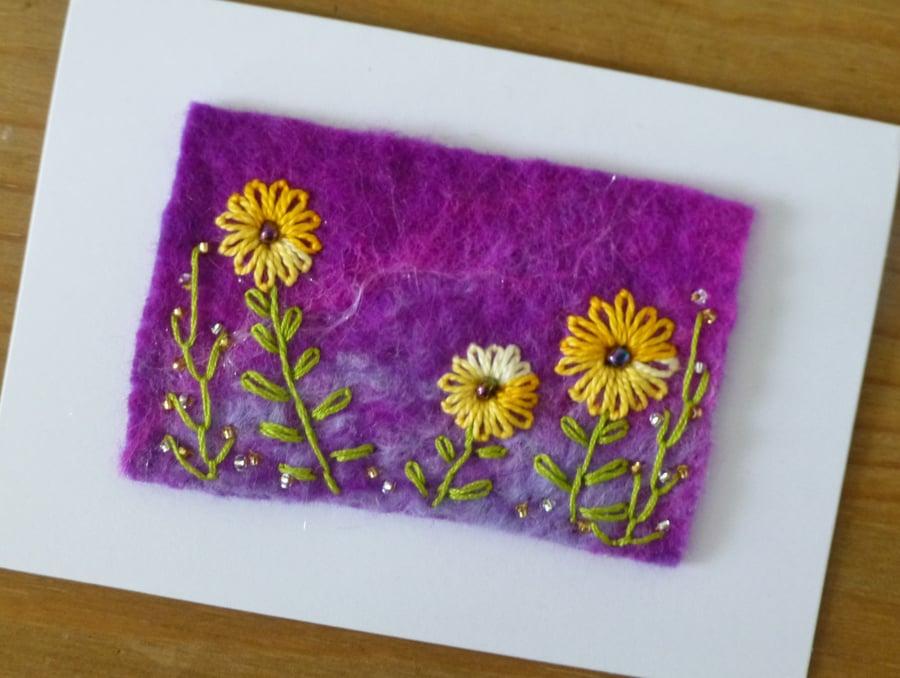 card with orange daisies 