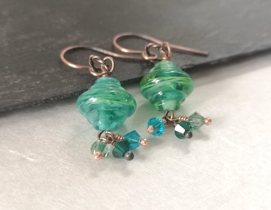 Green glass lamp work bead and Swarovski crystal earrings with copper ear wires 