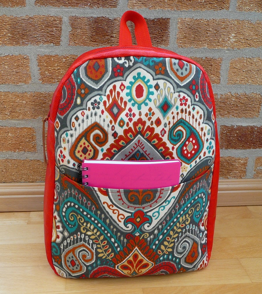 Backpack, Red vinyl and paisley backpack with zip pocket and zip top closure
