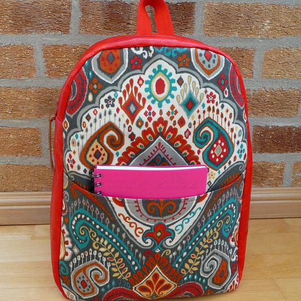 Backpack, Red vinyl and paisley backpack with zip pocket and zip top closure