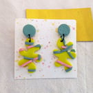 Blue and yellow splat dangly earings 