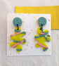 Blue and yellow splat dangly earings 