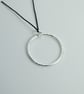 Large Silver Circle Necklace on Black Cotton Cord - Image 3