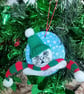 Christmas tree decoration of a Seal, airdry clay with a fabric hat and scarf.   - Image 5