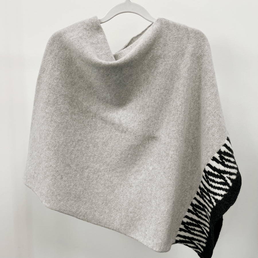 Zebra knitted poncho - zinc and monochrome