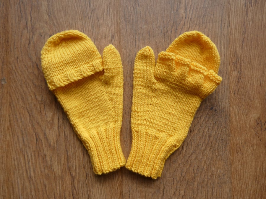 Knitted handmade yellow fingerless gloves that turn into mittens